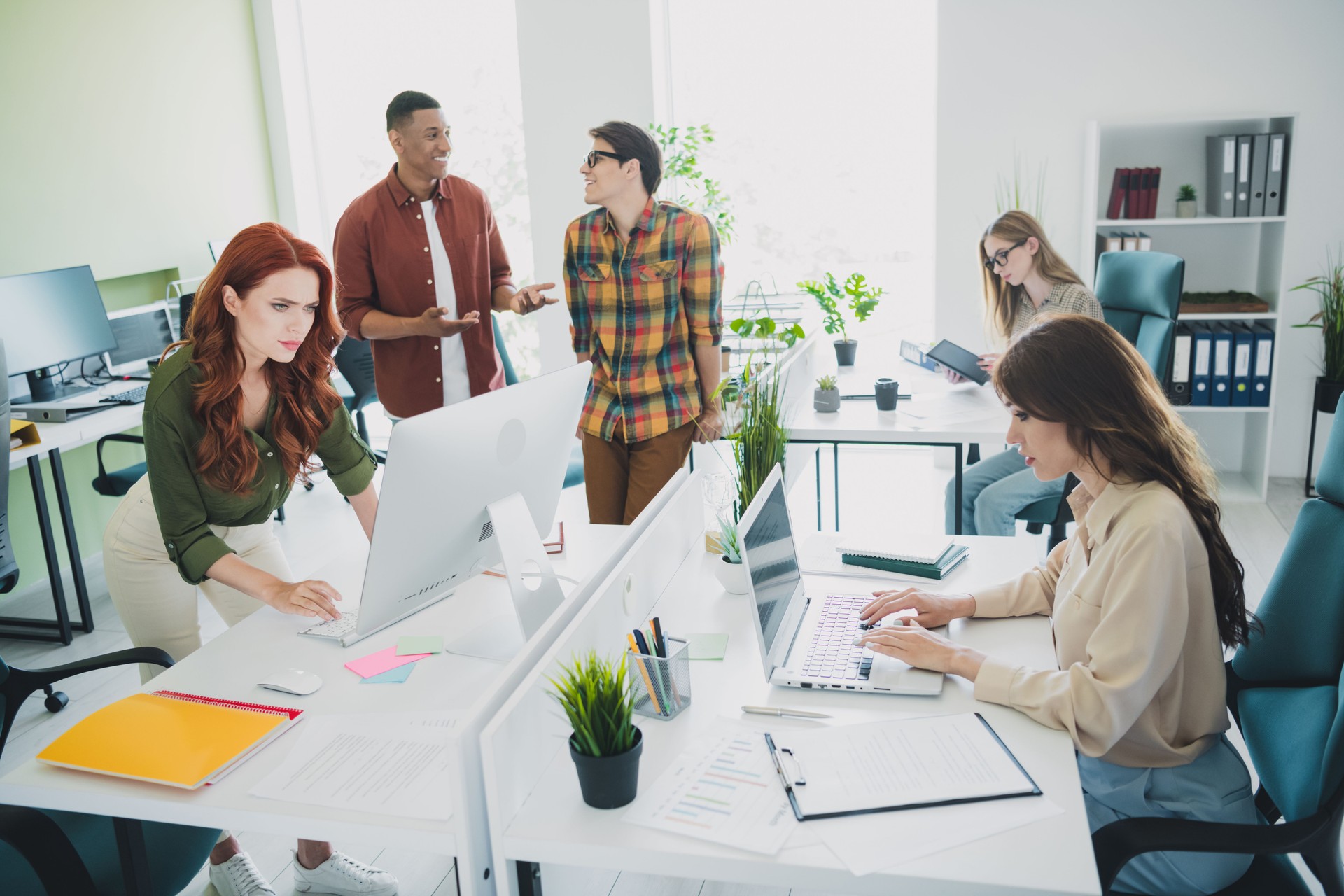 Portrait of five young successful colleagues communicate use computer workplace business center office indoors